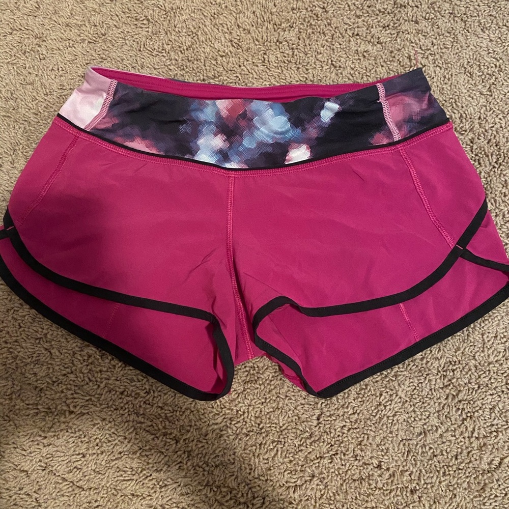Size 2 pink Lululemon workout shorts